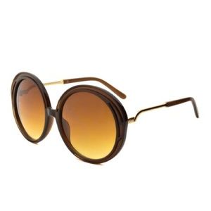 Brown framed metal arm oversized round sunglasses